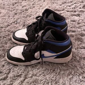 blue and white jordan’s